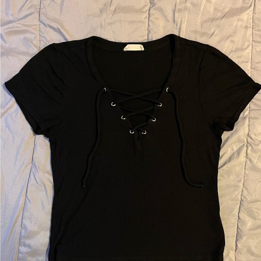 Black crop top with cris cross low cut in front